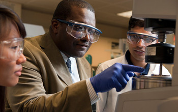 Lynden Archer with students in the lab